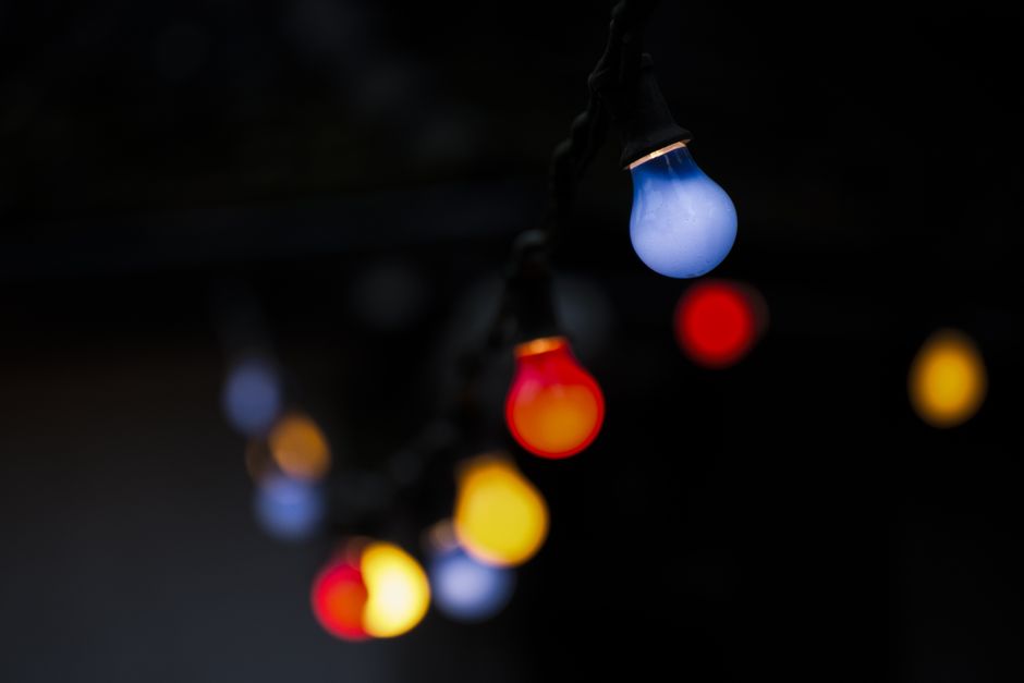 Vivid string lights capturing a festive and moody atmosphere.