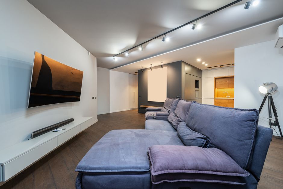 Spacious and stylish living room featuring modern furniture and minimalist design.