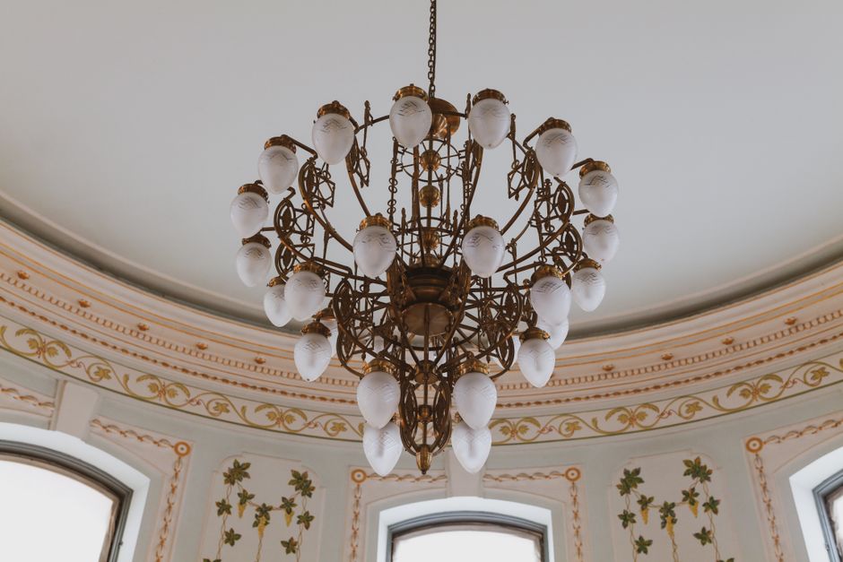 Elegant chandelier in a luxurious room at Hrvatska Kostajnica. Detailed ornate design.